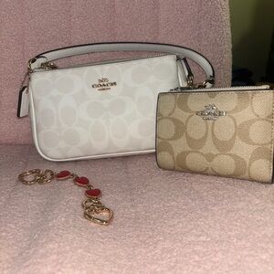coach purse, wallet, and red hearts extension for $200